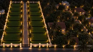 All sixteen Solitaire villa plots and the illuminated avenue at night