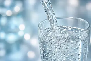 Fresh water being poured into a glass